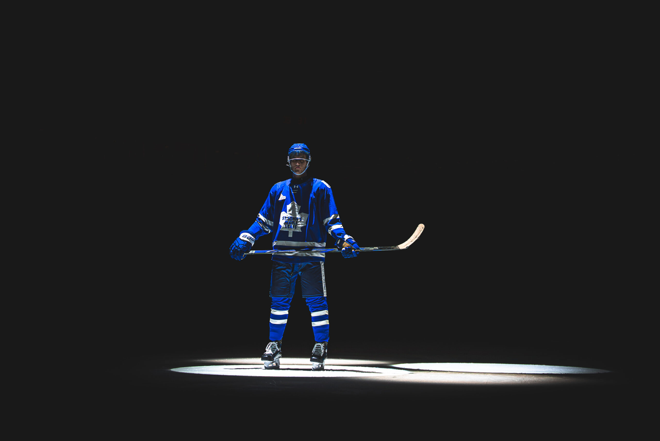 Regiment player in a St. John's Maple Leafs throwback jersey