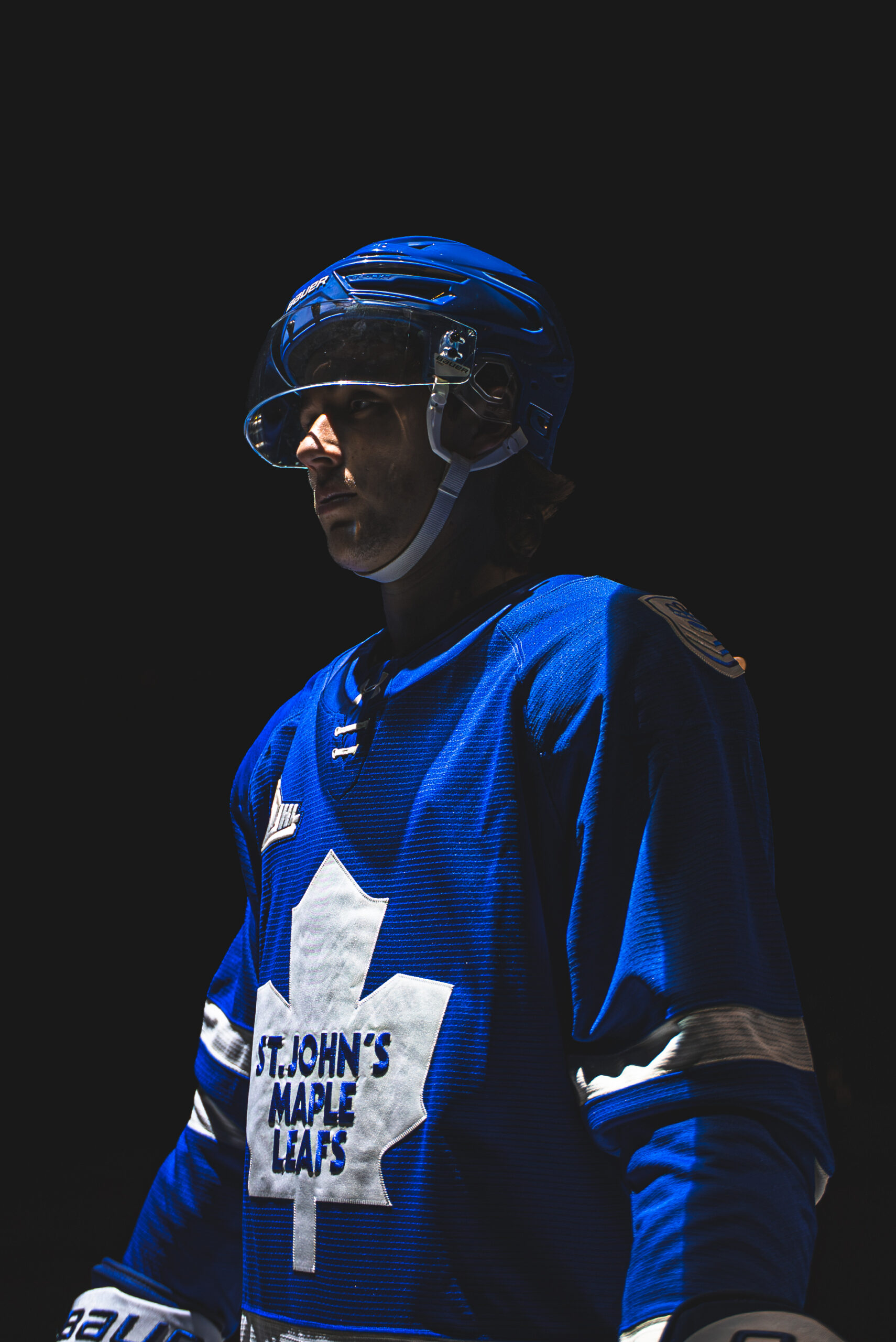 Close-up of a Regiment player in a St. John's Maple Leafs jersey